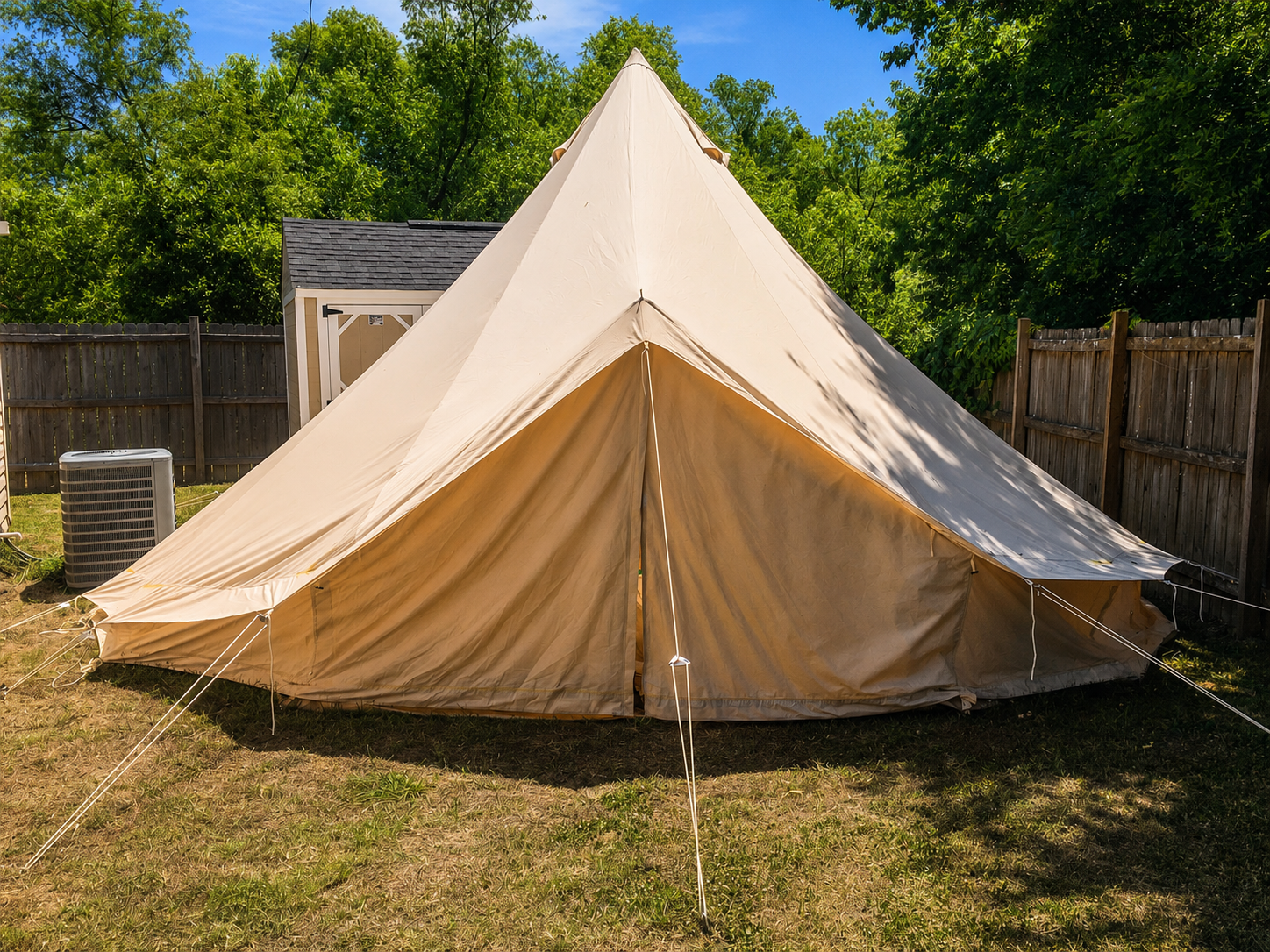 Large Glamp Camp bell tent installed in a Nashville backyard